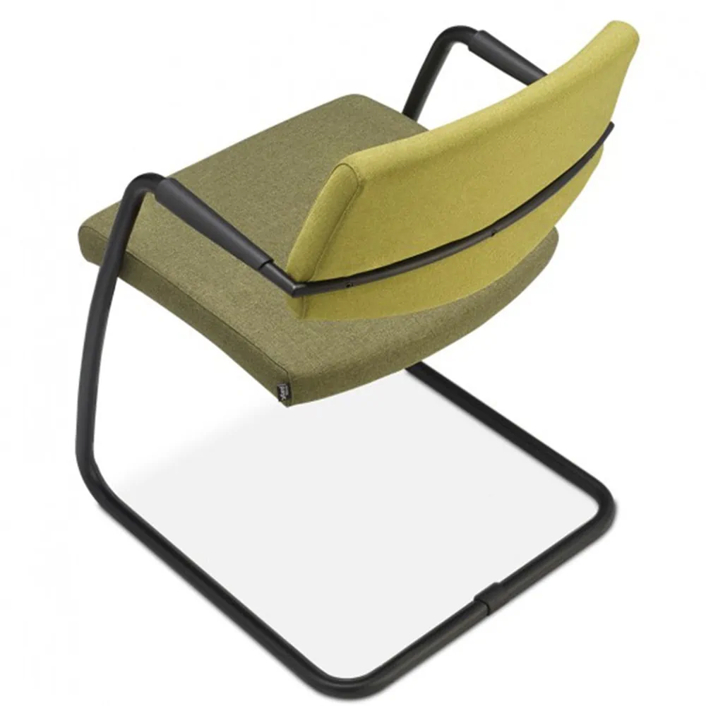Freischwinger Stuhl grünes Polster für Ergonomie produziert in der Schweiz Möbelhersteller